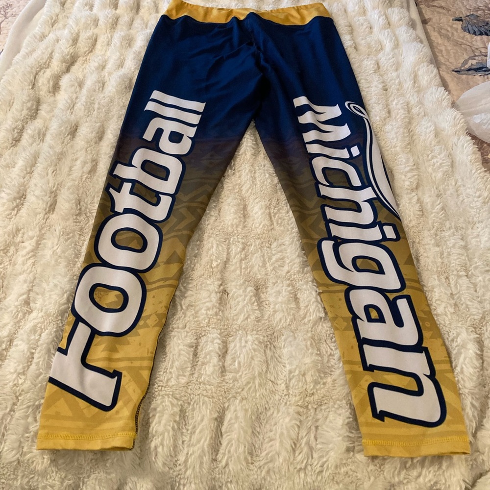University of Michigan football leggings size large.